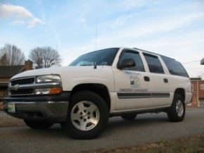 Emergency Management, white SUV on pavement